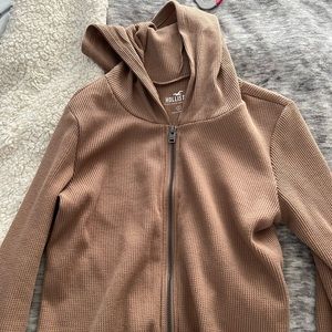 tan knitted zip up from hollister size small!